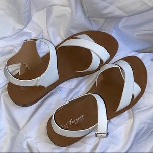 White sandals worn once